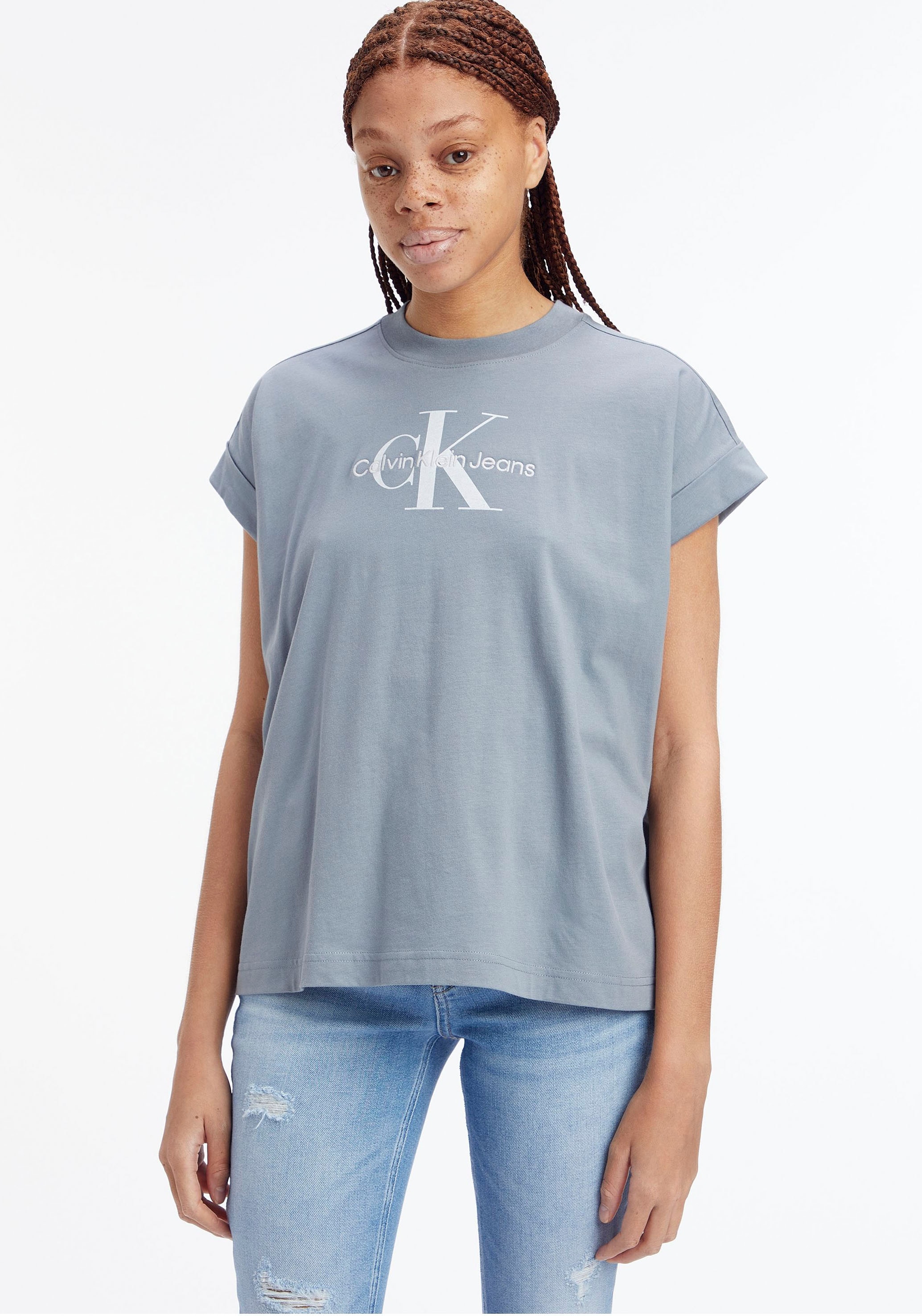 Calvin Klein mit Ärmeln an breitem Umschlagbund shoppen den T-Shirt, Jeans