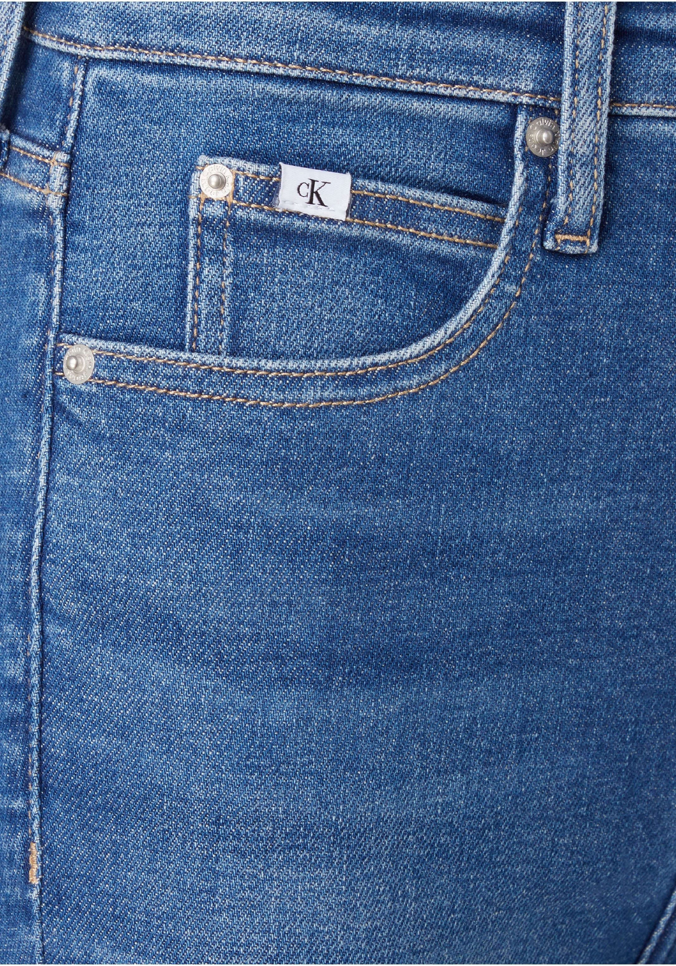 Calvin Klein am Leder-Brandlabel RISE Klein SKINNY«, mit »HIGH Skinny-fit-Jeans Calvin Jeans Bund bestellen hinten