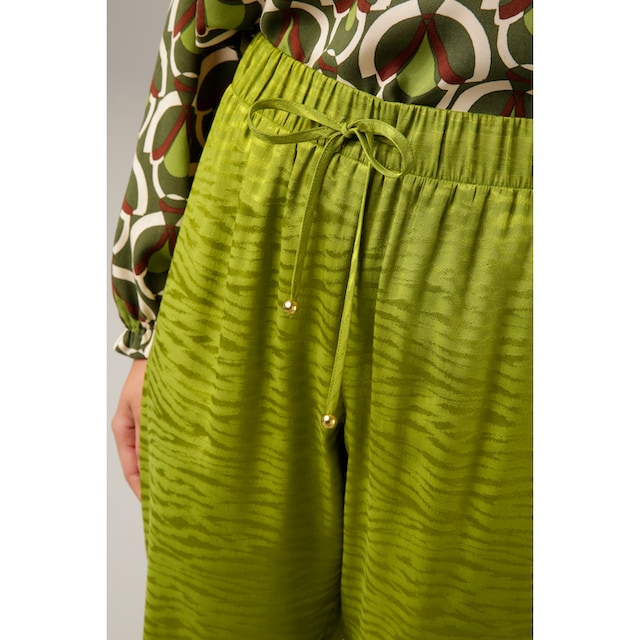 Aniston CASUAL Schlupfhose, mit trendigem, leicht glänzendem Struktur-Muster  shoppen
