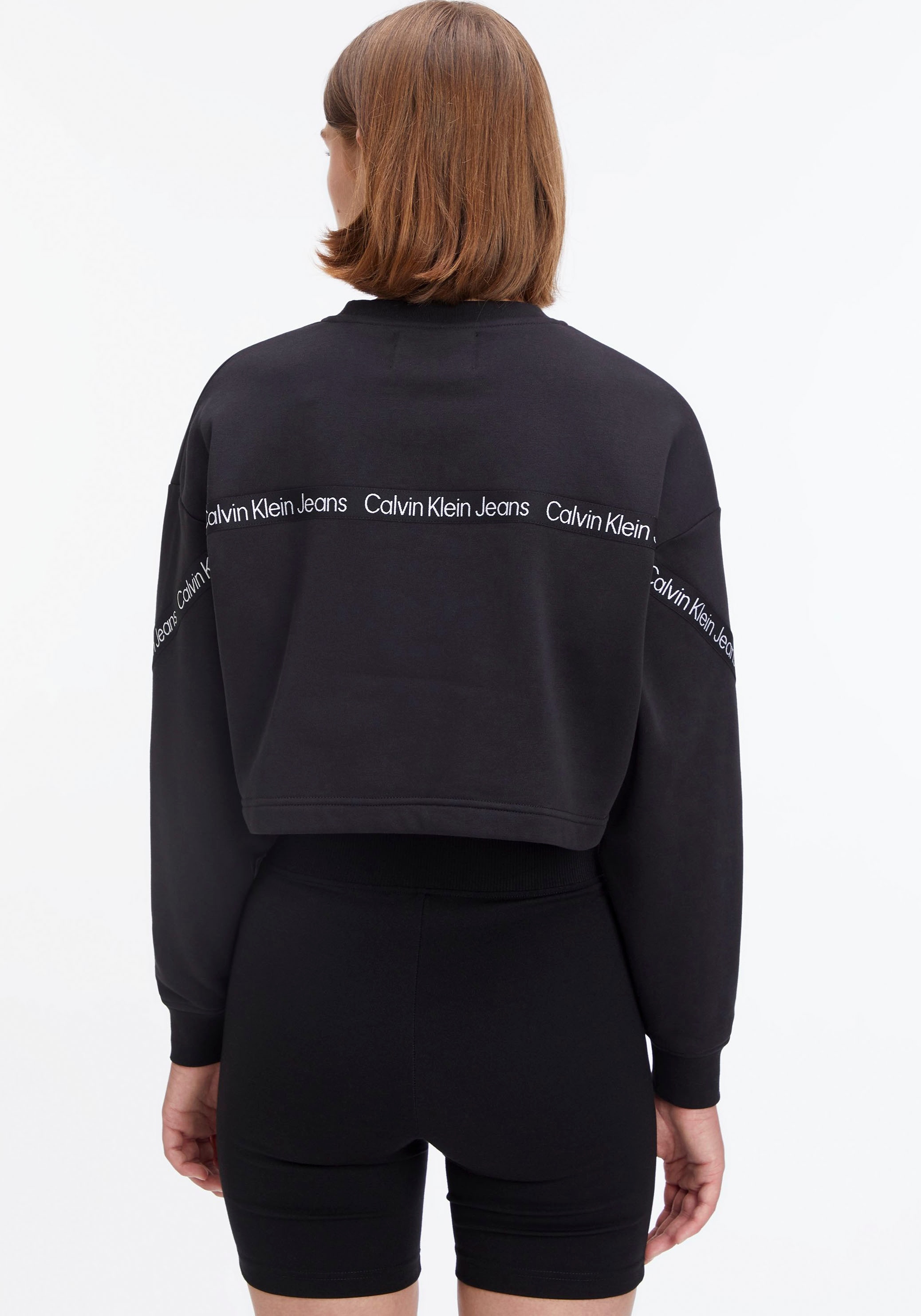 Calvin Klein Jeans Logo-Tape mit I\'m shoppen Sweatshirt, walking | Applikationen
